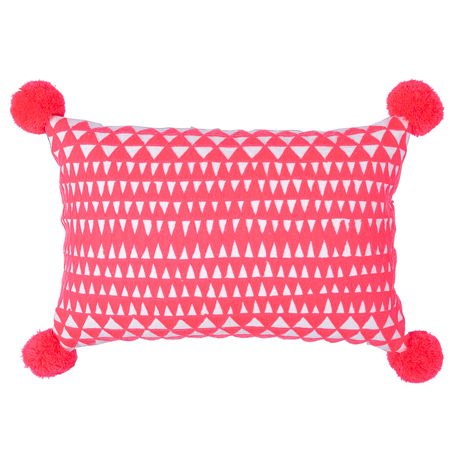 Coral pom pom cushion